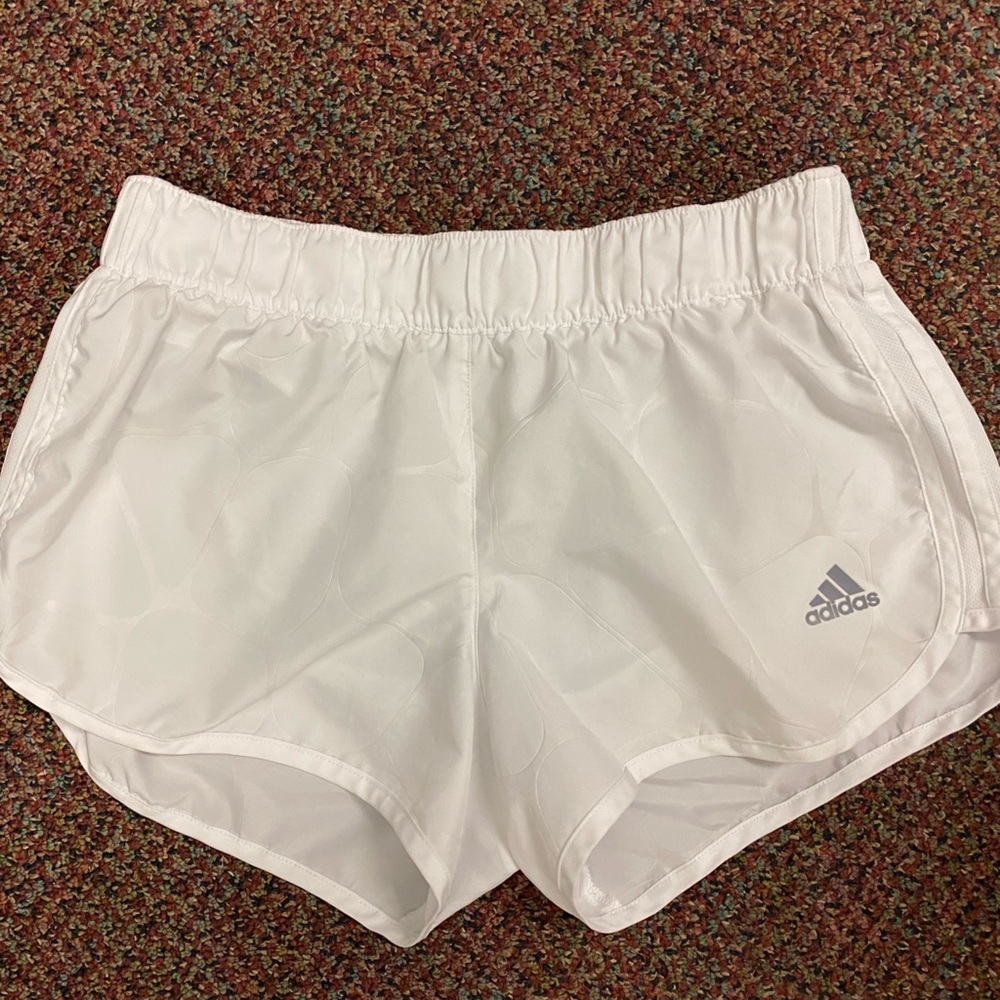 White Adidas giraffe spot athletic shorts